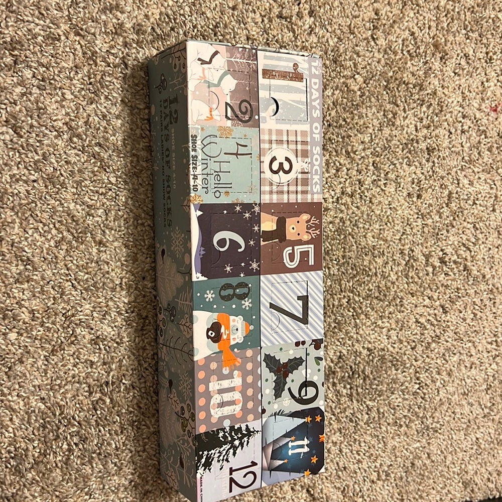 Never opened 12 days of socks. Size 4-10